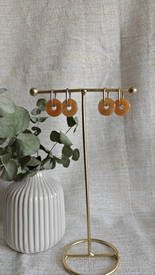 2025/11/1000036638-scaled.jpg Natuursteen Donut Huggie Tangerine